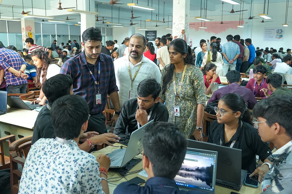 Photo from a past Vadodara Hackathon event showing participants and mentors.