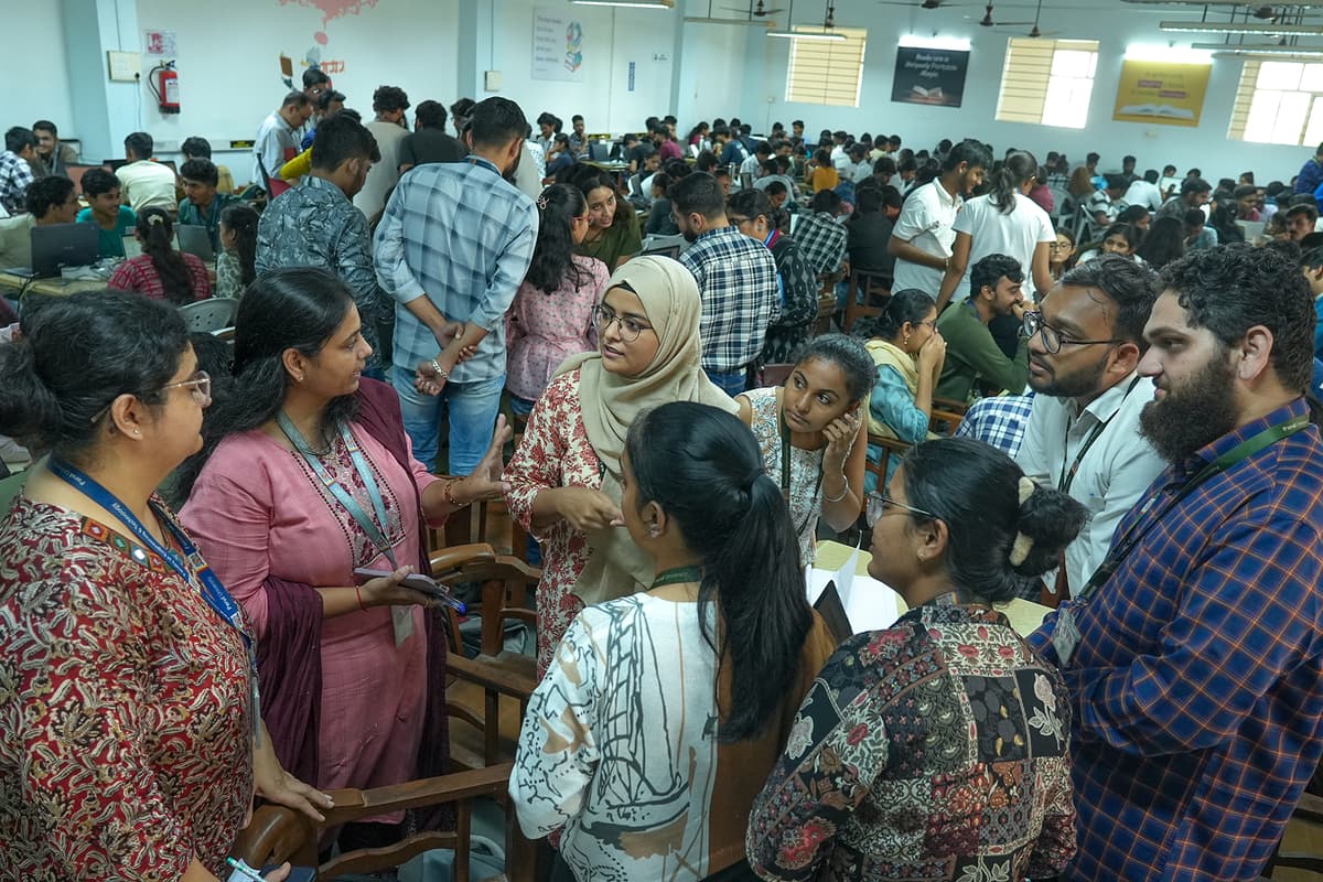 Photo from a past Vadodara Hackathon event showing participants and mentors.