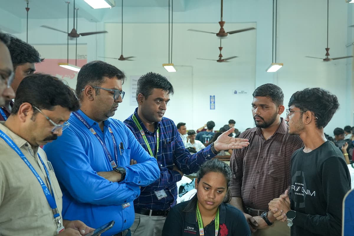 Photo from a past Vadodara Hackathon event showing participants and mentors.