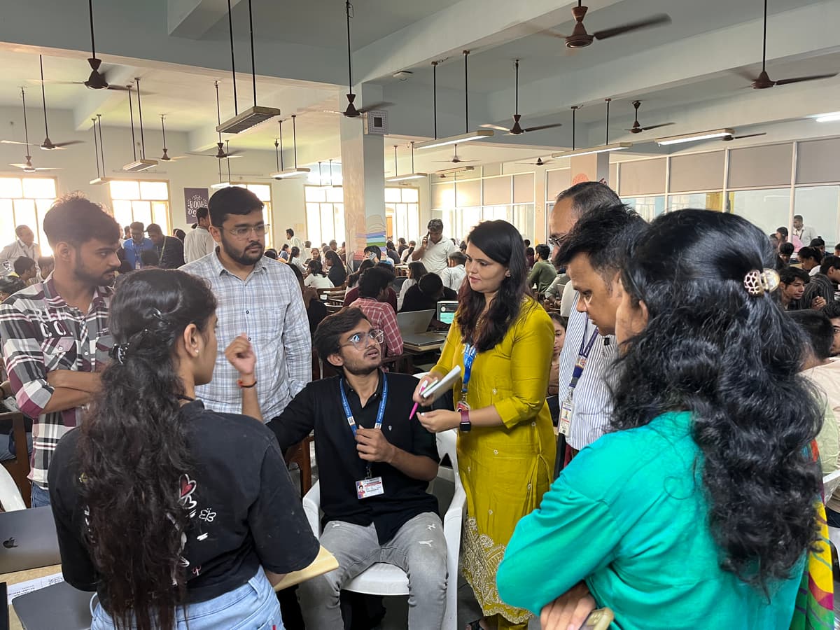 Photo from a past Vadodara Hackathon event showing participants and mentors.
