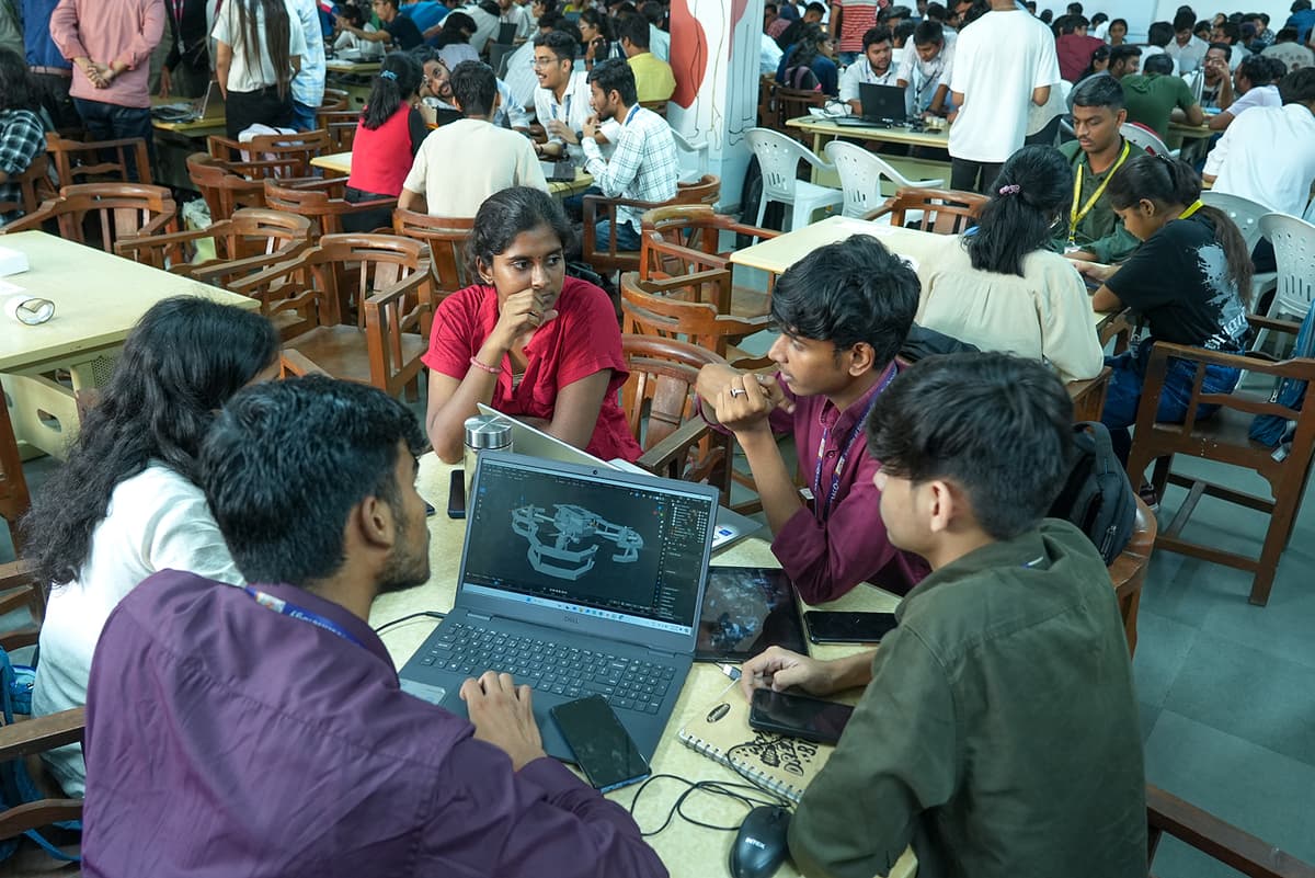 Photo from a past Vadodara Hackathon event showing participants and mentors.