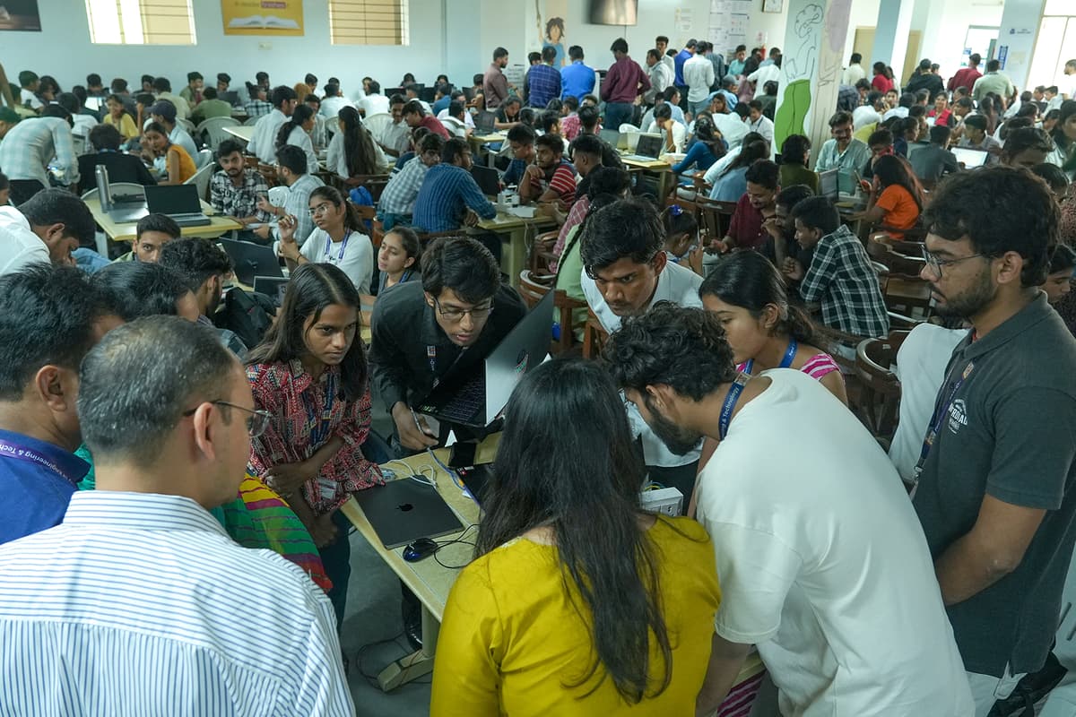 Photo from a past Vadodara Hackathon event showing participants and mentors.